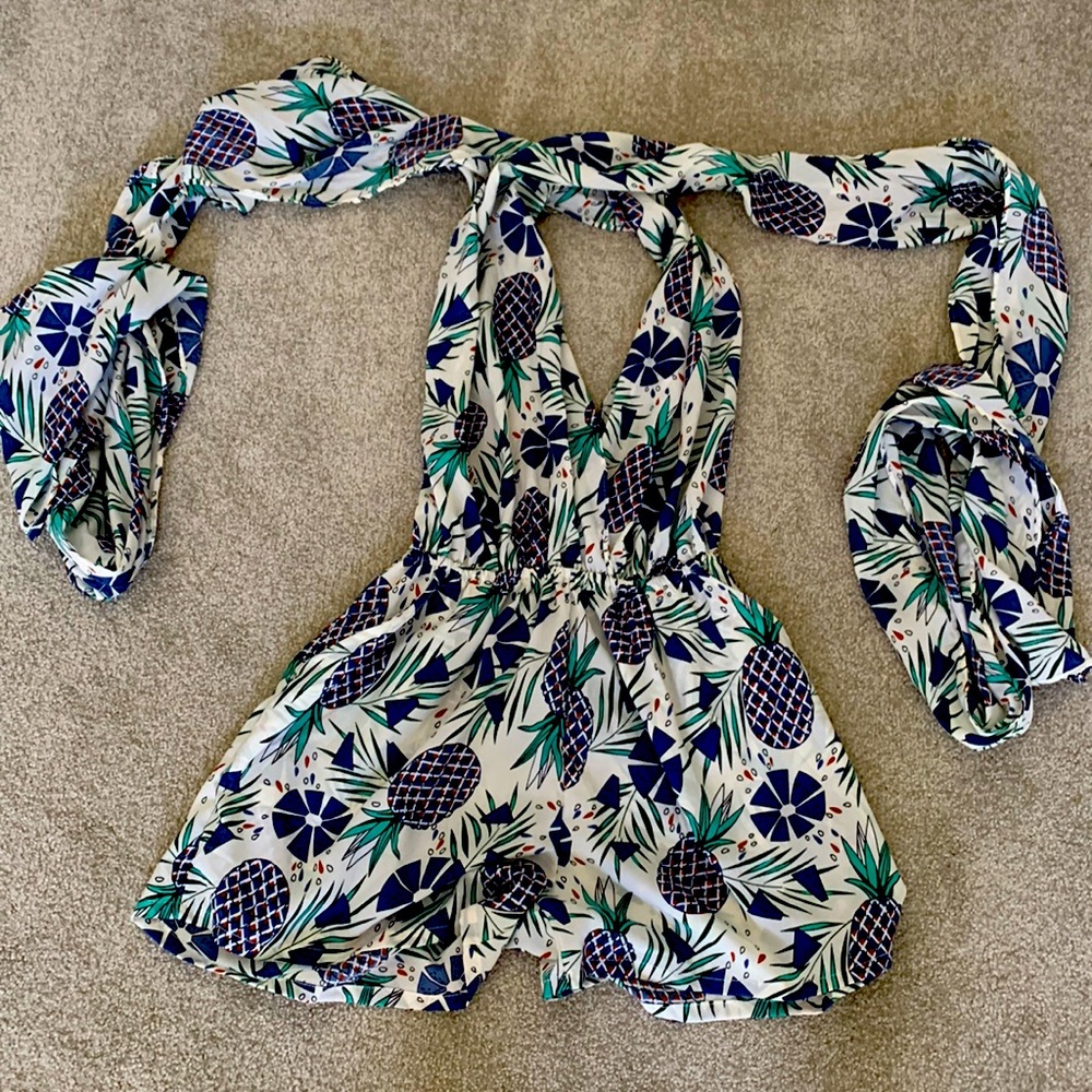 Summer romper with open back.
